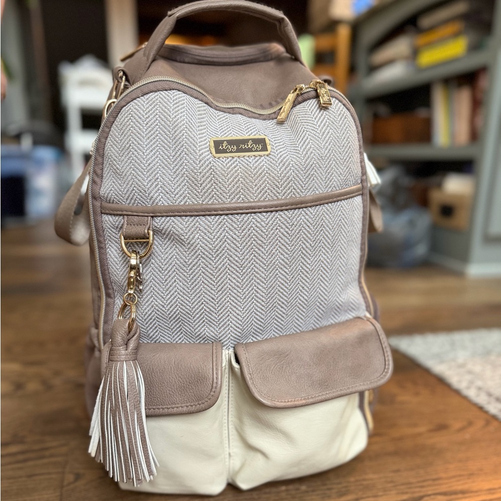 Itzy Ritzy cream and tan diaper bag